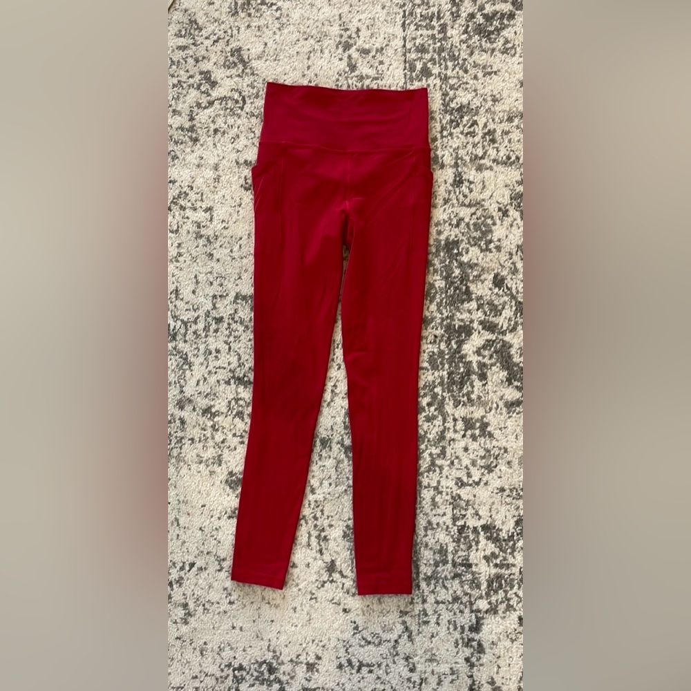 Red Salutation stash tight from Athleta. size xs